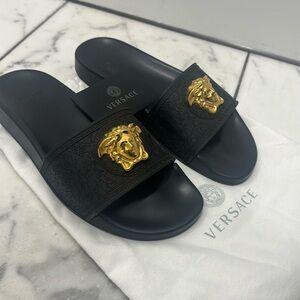 COPY - versace slides (these ended up not being sold) Open to buy